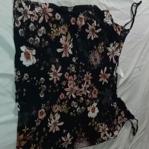 A spaghetti crop top sleeping shirt